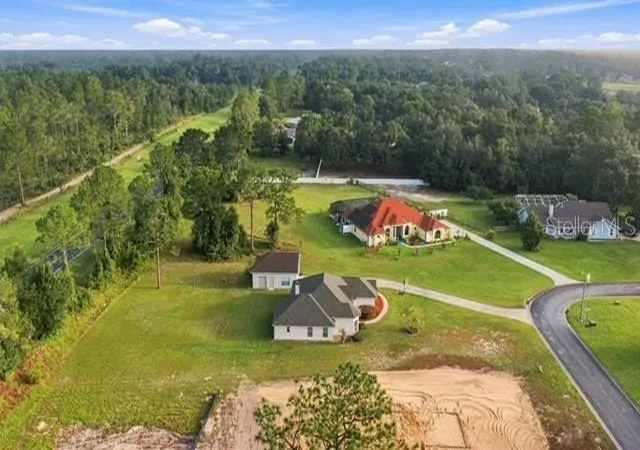 Photo 2 of Single family home for sale at 5931 NE 57th Loop, Silver Springs, FL 34488 | MLS# OM731899 | Listing updated on 2026-09-21
