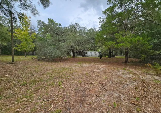 Photo 1 of Manufactured home for sale at 7651 Ne 128th Lane, Bronson, FL 32621 | MLS# OM731915 | Listing updated on 2026-09-12