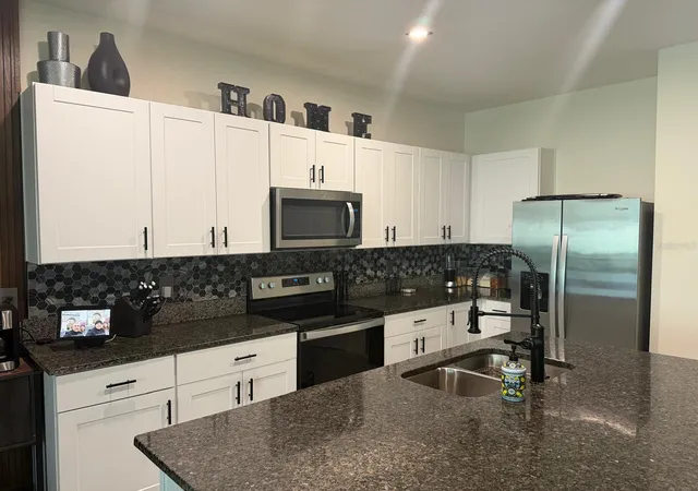 Photo 4 of Townhouse for sale at 1346 Isleta Loop, Kissimmee, FL 34741 | MLS# S5157188 | Listing updated on 2026-09-30