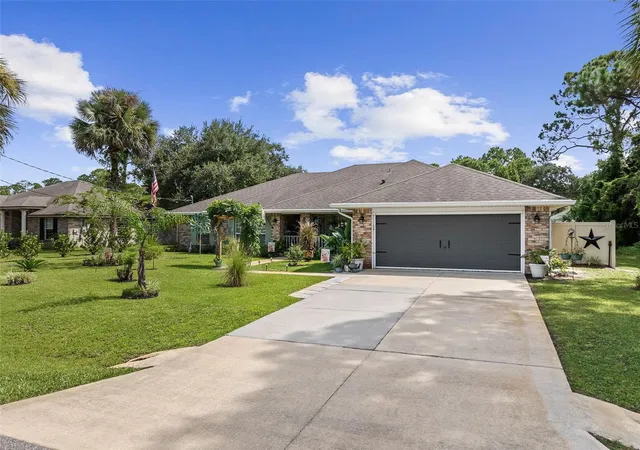 Photo 1 of Single family home for sale at 14 Port Ln, Palm Coast, FL 32164 | MLS# FC321295 | Listing updated on 2026-10-25