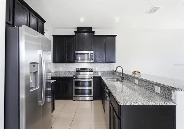 Photo 3 of Townhouse for sale at 2615 Giardino Loop, Kissimmee, FL 34741 | MLS# S5157200 | Listing updated on 2026-10-01