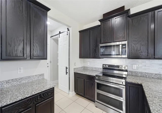 Photo 4 of Townhouse for sale at 2615 Giardino Loop, Kissimmee, FL 34741 | MLS# S5157200 | Listing updated on 2026-10-01