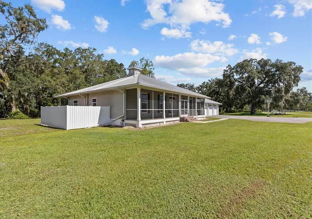 Photo 3 of Single family home for sale at 7041 Quarterhorse Ln, Brooksville, FL 34604 | MLS# W7889321 | Listing updated on 2026-09-12