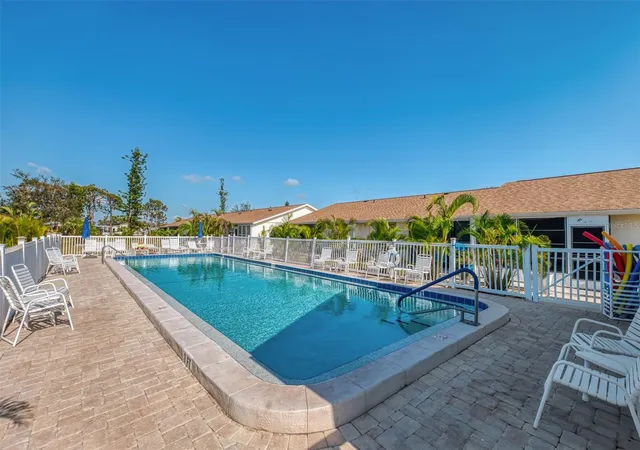 Listing Photo 2 - Condo for sale in building located at 6796 Gasparilla Pines Blvd, ENGLEWOOD, FL 34224 - Unit #54