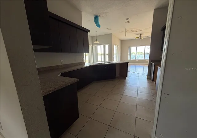 Photo 4 of Single family home for sale at 14639 Grand Cvs Dr, Orlando, FL 32837 | MLS# O6440272 | Listing updated on 2026-10-30