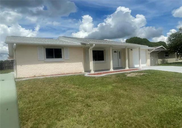 Photo 3 of Single family home for sale at 7025 Cutty Sark Dr, Port Richey, FL 34668 | MLS# W7889331 | Listing updated on 2026-10-04