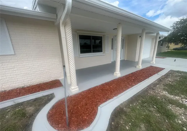 Photo 3 of Single family home for sale at 7025 Cutty Sark Dr, Port Richey, FL 34668 | MLS# W7889331 | Listing updated on 2026-10-04