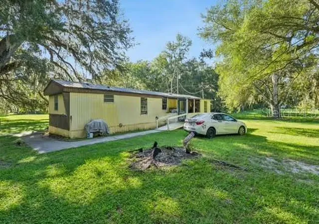 Photo 2 of Manufactured home for sale at 3302 County Rd 510a, Wildwood, FL 34785 | MLS# O6440294 | Listing updated on 2026-10-05