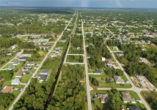 Photo 1 of Land for sale at 739 Theodore Vail St E, Lehigh Acres, FL 33974 | MLS# O6440316 | Listing updated on 2026-09-21