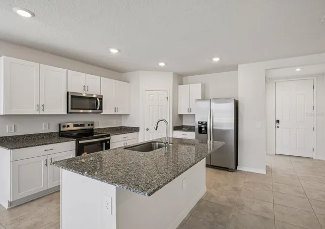 Photo 2 of Single family home for sale at 3933 Giorgio Dr, Winter Haven, FL 33884 | MLS# TB8546812 | Listing updated on 2026-09-23