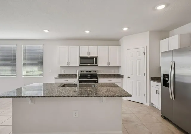 Photo 3 of Single family home for sale at 3933 Giorgio Dr, Winter Haven, FL 33884 | MLS# TB8546812 | Listing updated on 2026-09-23