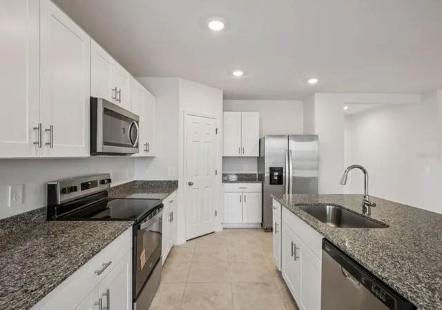 Photo 4 of Single family home for sale at 3933 Giorgio Dr, Winter Haven, FL 33884 | MLS# TB8546812 | Listing updated on 2026-09-23