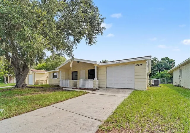 Photo 2 of Single family home for sale at 10036 Glen Moor Ln, Port Richey, FL 34668 | MLS# O6440317 | Listing updated on 2026-10-02