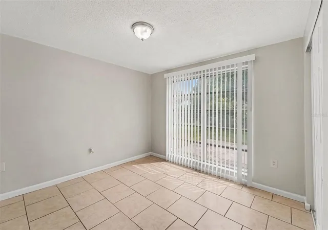 Photo 3 of Single family home for sale at 10036 Glen Moor Ln, Port Richey, FL 34668 | MLS# O6440317 | Listing updated on 2026-10-02