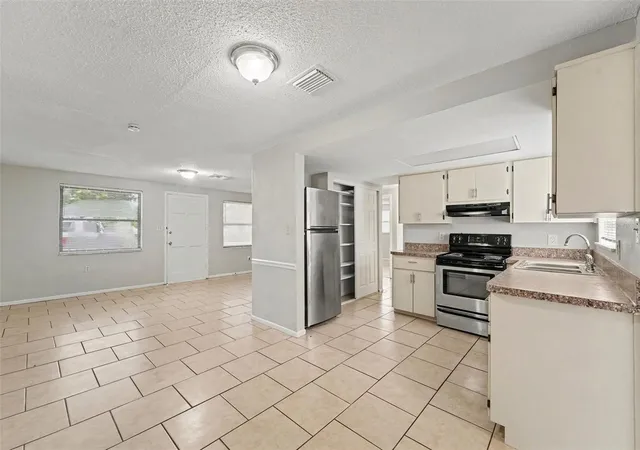 Photo 4 of Single family home for sale at 10036 Glen Moor Ln, Port Richey, FL 34668 | MLS# O6440317 | Listing updated on 2026-10-02