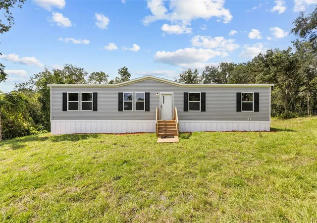 Photo 1 of Manufactured home for sale at 31608 Skyline Dr, Deland, FL 32720 | MLS# O6440340 | Listing updated on 2026-09-23