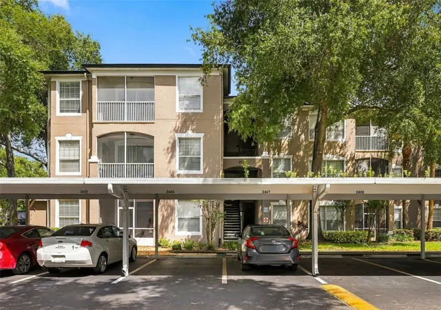 Photo 1 of Condo for sale at 7135 Yacht Basin Ave #211, Orlando, FL 32835 | MLS# O6440343 | Listing updated on 2026-09-24