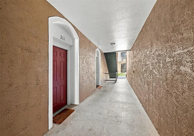 Photo 2 of Condo for sale at 7135 Yacht Basin Ave #211, Orlando, FL 32835 | MLS# O6440343 | Listing updated on 2026-09-24