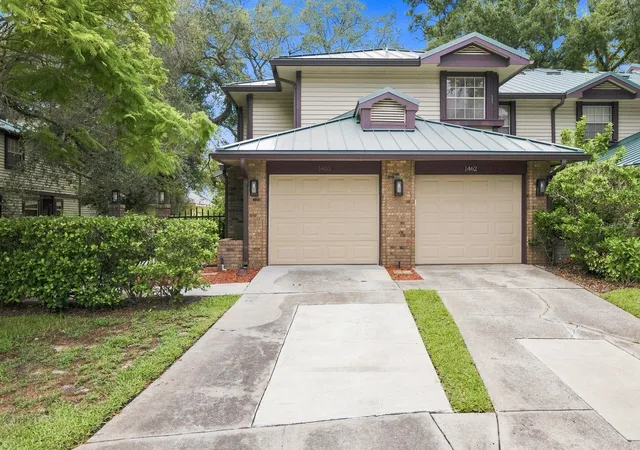 Photo 1 of Condo for sale at 1460 Mahogany Ln, Palm Harbor, FL 34683 | MLS# TB8546882 | Listing updated on 2026-09-21