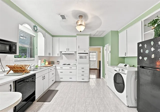 Photo 2 of Single family home for sale at 8911 N Highland Ave, Tampa, FL 33604 | MLS# TB8546883 | Listing updated on 2026-09-15
