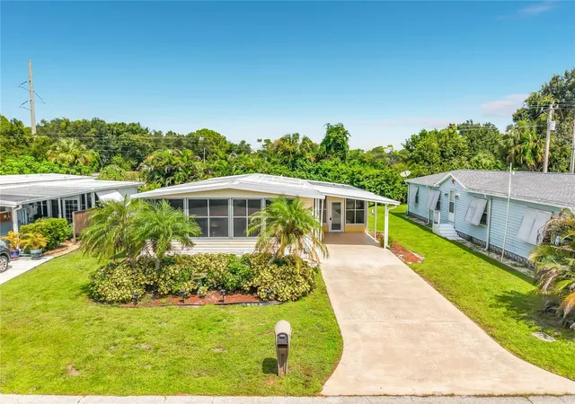 Photo 2 of Manufactured home for sale at 225 Shrub Ln N, North Fort Myers, FL 33917 | MLS# W7889340 | Listing updated on 2026-09-22