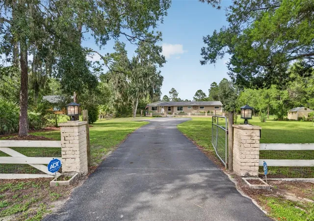 Photo 2 of Single family home for sale at 20963 E Colonial Dr, Christmas, FL 32709 | MLS# O6440384 | Listing updated on 2026-09-13