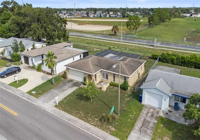 Photo 2 of Single family home for sale at 8351 Fox Holw Dr, Port Richey, FL 34668 | MLS# TB8546913 | Listing updated on 2026-09-14