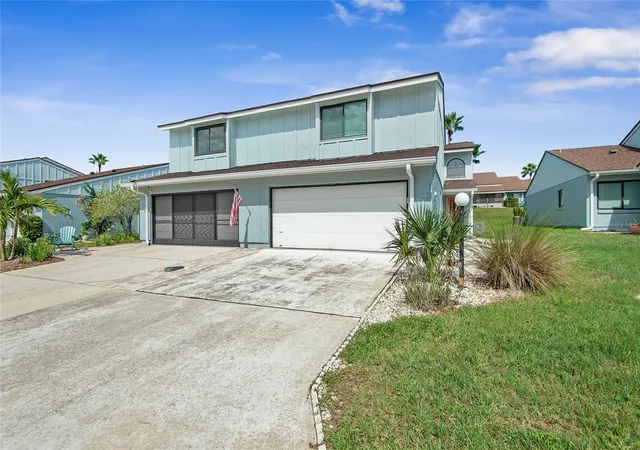 Photo 1 of Townhouse for sale at 1752 Windsong Cir, Flagler Beach, FL 32136 | MLS# FC321318 | Listing updated on 2026-09-17