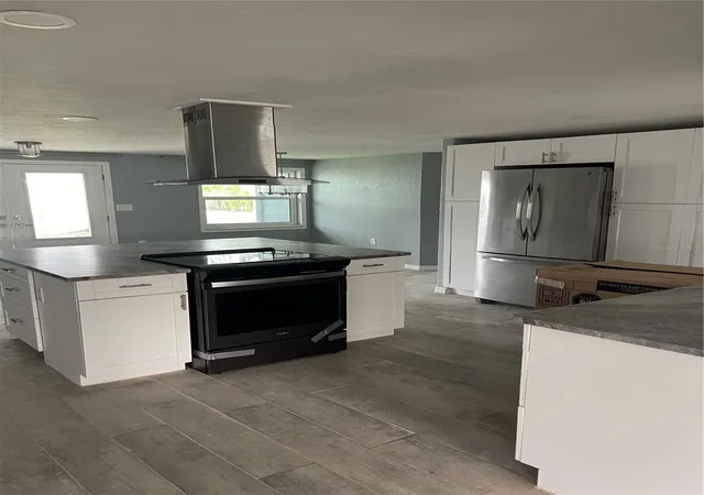 Photo 4 of Single family home for sale at 13701 Leslie Dr, Hudson, FL 34667 | MLS# TB8546950 | Listing updated on 2026-09-13