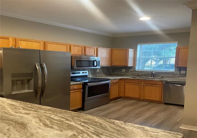Photo 4 of Sale Pending at 1934 Fiesta Ridge Ct, Tampa, FL 33604 | MLS# TB8546996 | Listing updated on 2026-09-27