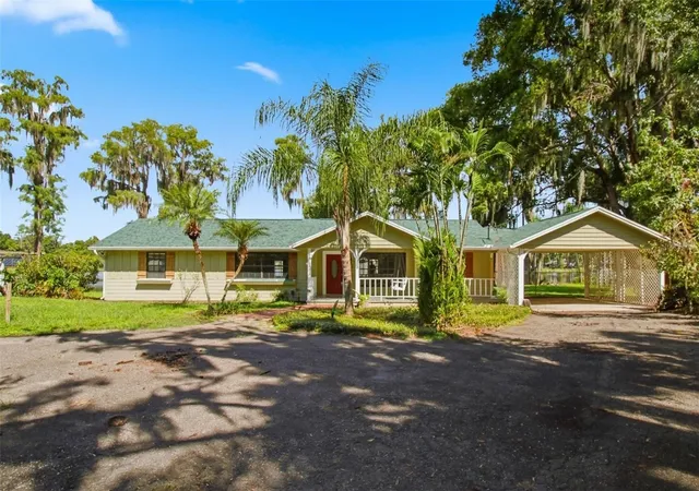 Photo 2 of Single family home for sale at 703 Crystal Lake Rd, Lutz, FL 33548 | MLS# TB8546999 | Listing updated on 2026-09-19