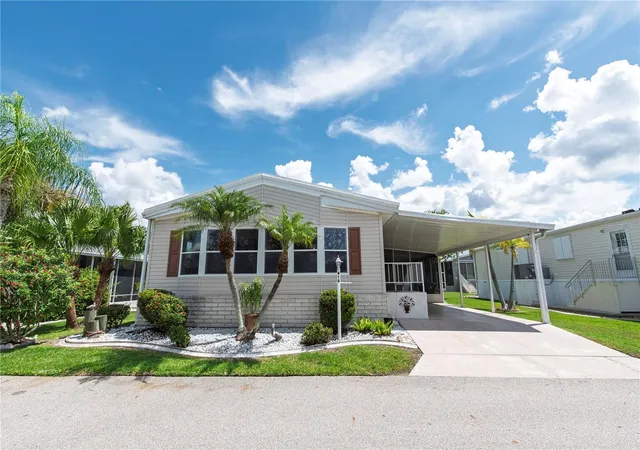 Photo 2 of Manufactured home for sale at 14 Holland Dr, Punta Gorda, FL 33950 | MLS# C7530553 | Listing updated on 2026-09-14