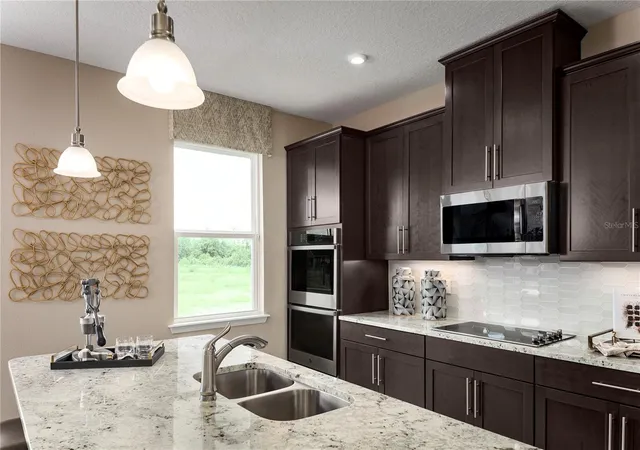 Photo 3 of Single family home for sale at 11161 Nellie Xing Cir, Clermont, FL 34711 | MLS# W7889357 | Listing updated on 2026-09-15