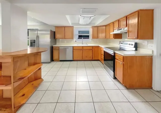 Photo 4 of Single family home for sale at 2530 Flintwood Dr, Holiday, FL 34690 | MLS# TB8547062 | Listing updated on 2026-09-16