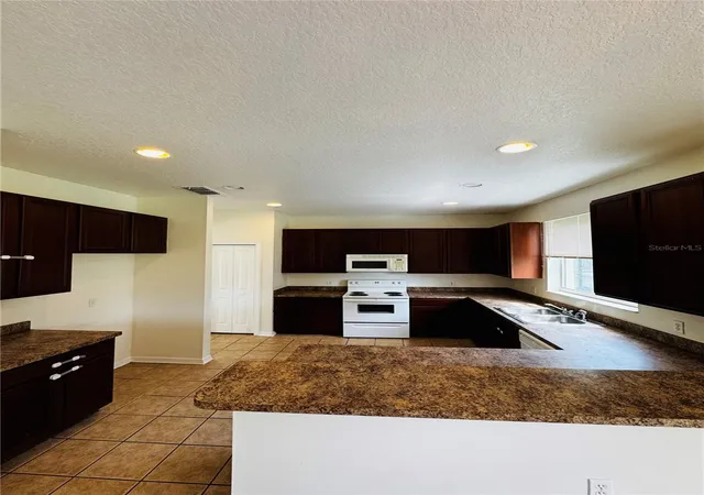 Photo 4 of Single family home for sale at 890 Mcinnis Ct, Kissimmee, FL 34744 | MLS# V4951197 | Listing updated on 2026-09-16