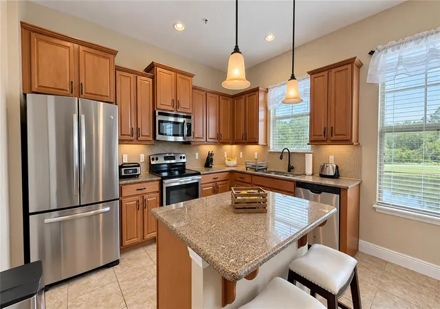 Photo 4 of Townhouse for sale at 10870 Sunset Ridge Ln, Orlando, FL 32832 | MLS# O6440521 | Listing updated on 2026-10-13