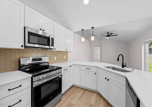 Photo 4 of Single family home for sale at 7455 Gates Cir, Spring Hill, FL 34606 | MLS# TB8547149 | Listing updated on 2026-09-12