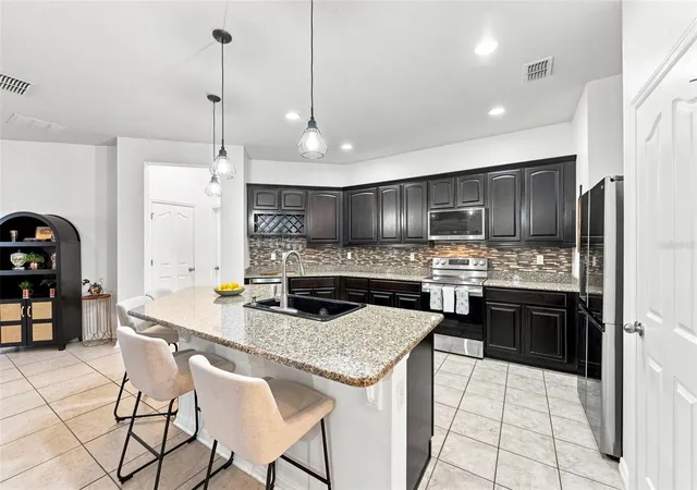 Photo 3 of Single family home for sale at 14311 Romeo Blvd, Wimauma, FL 33598 | MLS# TB8547150 | Listing updated on 2026-09-26