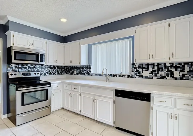 Listing Photo 4 - Condo for sale in building located at 4448 Chart Ct, NEW PORT RICHEY, FL 34652 - Unit #5-C