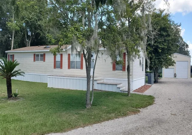 Photo 2 of Manufactured home for sale at 4902 Country Trails Dr, Polk City, FL 33868 | MLS# P4939841 | Listing updated on 2026-09-21