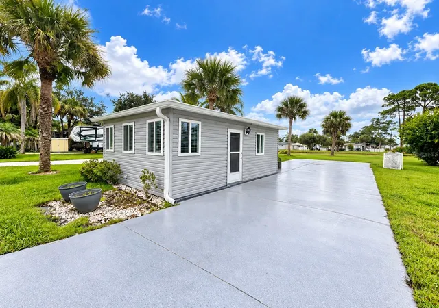 Photo 2 of Single family home for sale at 411 Oak Cvs Rd, Titusville, FL 32780 | MLS# FC321343 | Listing updated on 2026-09-14