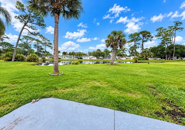 Photo 3 of Single family home for sale at 411 Oak Cvs Rd, Titusville, FL 32780 | MLS# FC321343 | Listing updated on 2026-09-14