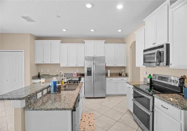 Photo 3 of Single family home for sale at 1586 Thetford Cir, Orlando, FL 32824 | MLS# O6440644 | Listing updated on 2026-09-12
