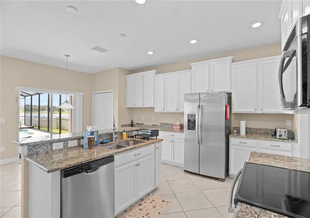 Photo 4 of Single family home for sale at 1586 Thetford Cir, Orlando, FL 32824 | MLS# O6440644 | Listing updated on 2026-09-12