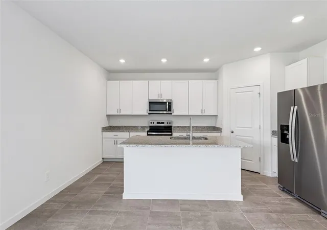 Photo 4 of Single family home for sale at 89 Wandering Crk Way, Palm Coast, FL 32164 | MLS# TB8547240 | Listing updated on 2026-09-19