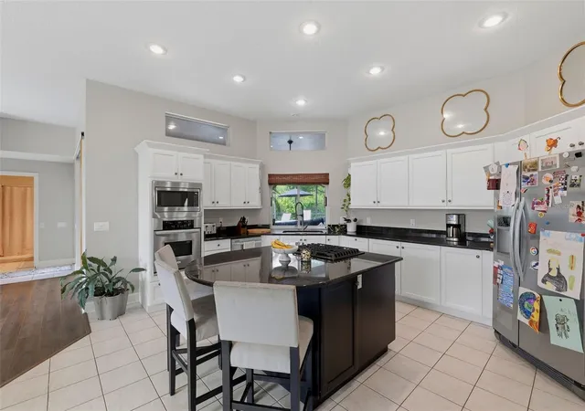 Photo 3 of Single family home for sale at 12012 Brewster Dr, Tampa, FL 33626 | MLS# TB8547272 | Listing updated on 2026-09-26