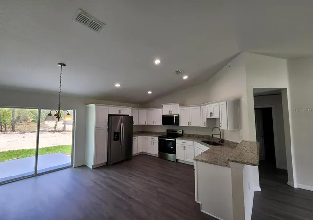 Photo 2 of Single family home for sale at 10277 SE 158th Place, Summerfield, FL 34491 | MLS# OM732025 | Listing updated on 2026-09-13