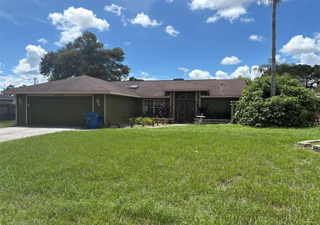 Photo 2 of Single family home for sale at 12300 Ronald St, Spring Hill, FL 34609 | MLS# W7889384 | Listing updated on 2026-10-05