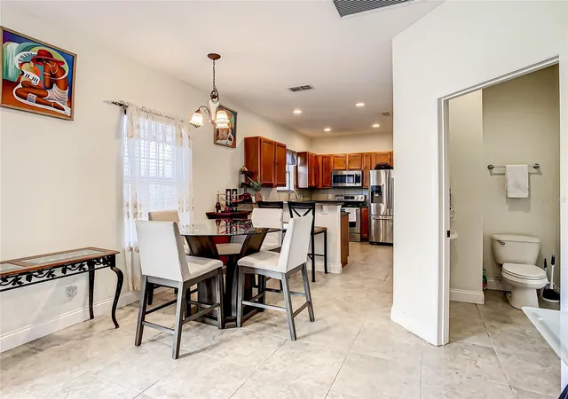 Photo 4 of Single family home for sale at 8735 Isla Bella Dr, Orlando, FL 32818 | MLS# S5157311 | Listing updated on 2026-09-16