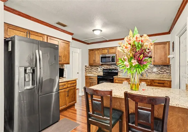 Photo 2 of Single family home for sale at 2422 Berry Rd, Plant City, FL 33567 | MLS# TB8547324 | Listing updated on 2026-10-09